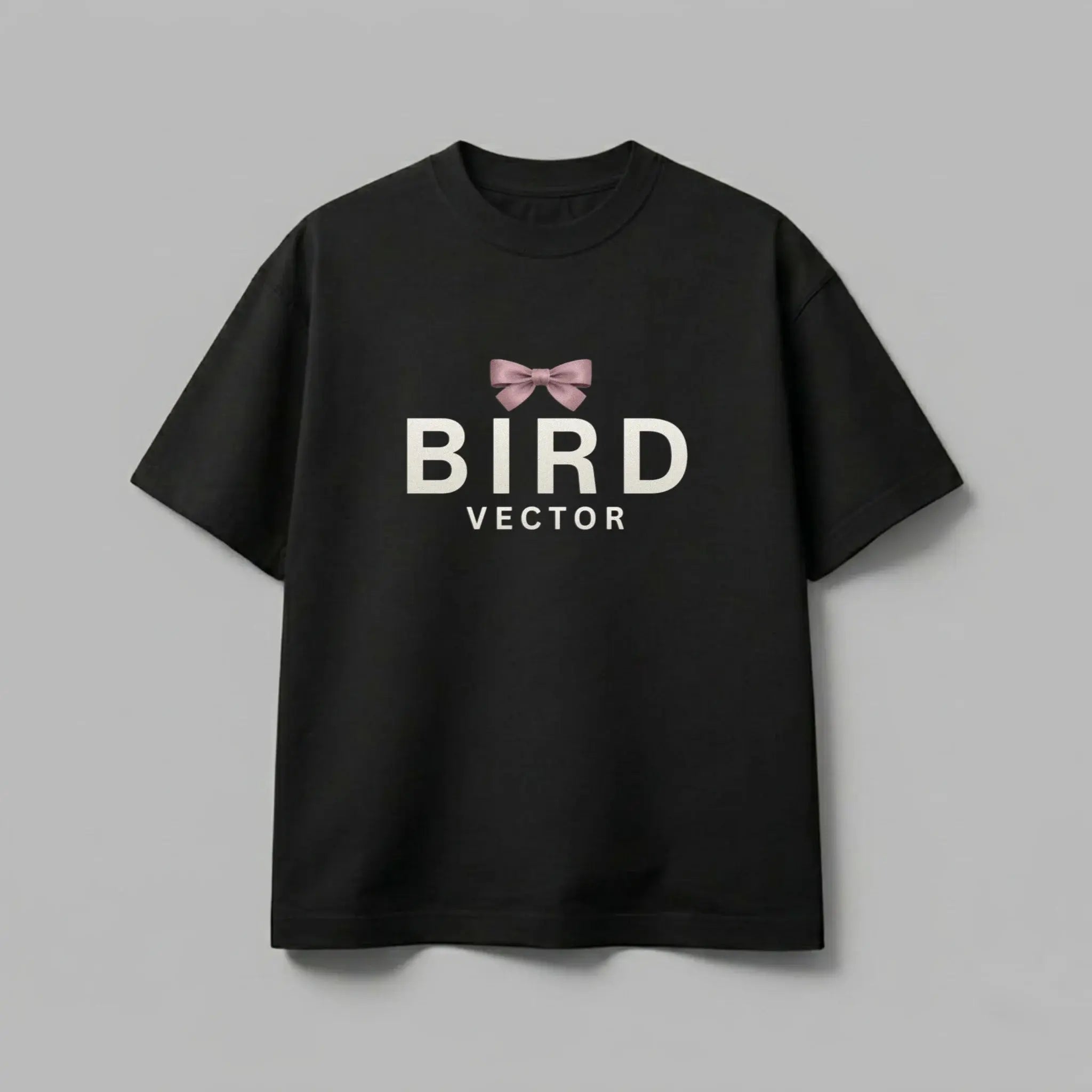 Mauve ribbon bow graphic on a black t-shirt 180gsm organic ringspun cotton featuring BIRD VECTOR minimalist text branding.